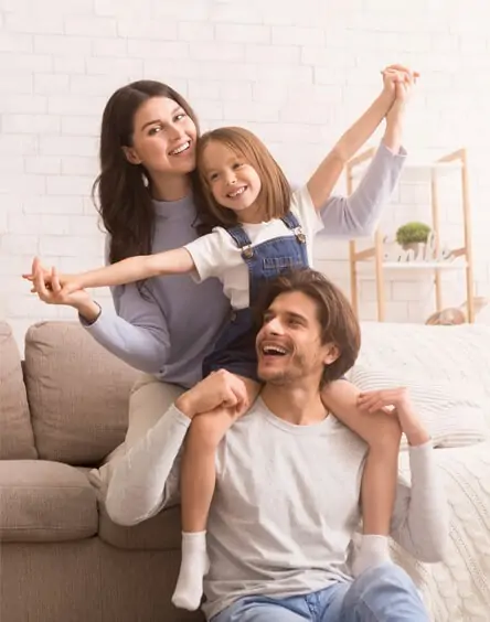 Family celebrating debt consolidation success with personal loan from Rocketship Financial
